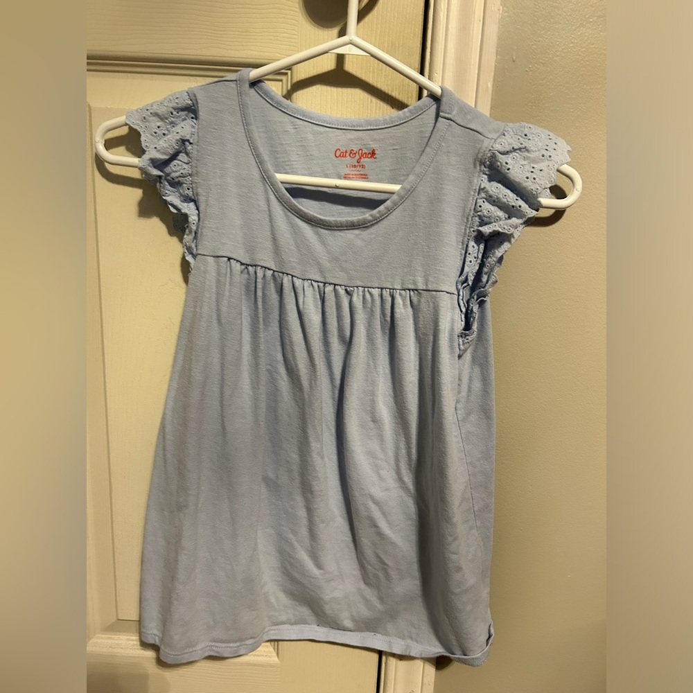 Cat & Jack children’s tee shirt size L (10-12). Light blue. A-line style. Girl